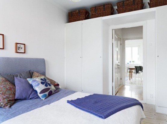 cozy scandinavian bedrooms 8 554x412 Cùng nhìn qua bộ thiết kế phòng ngủ phong Scandinavia đầy quyến rũ